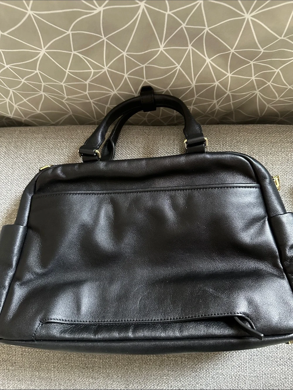 Tumi Leather Adrian Voyageur with Gold Hardware